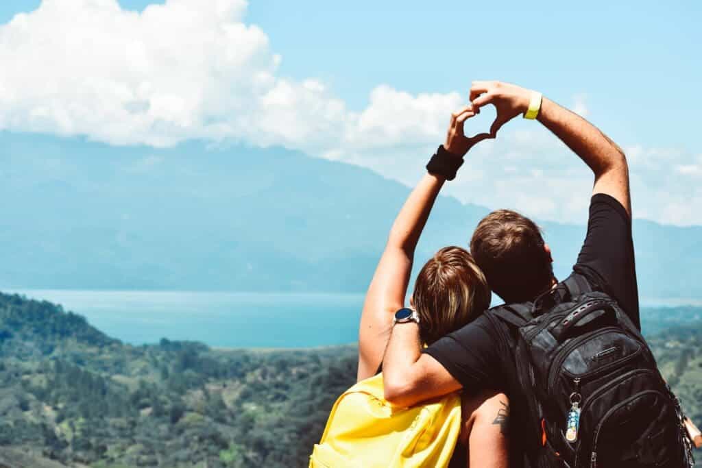 Two People Forming Heart Hand Shape