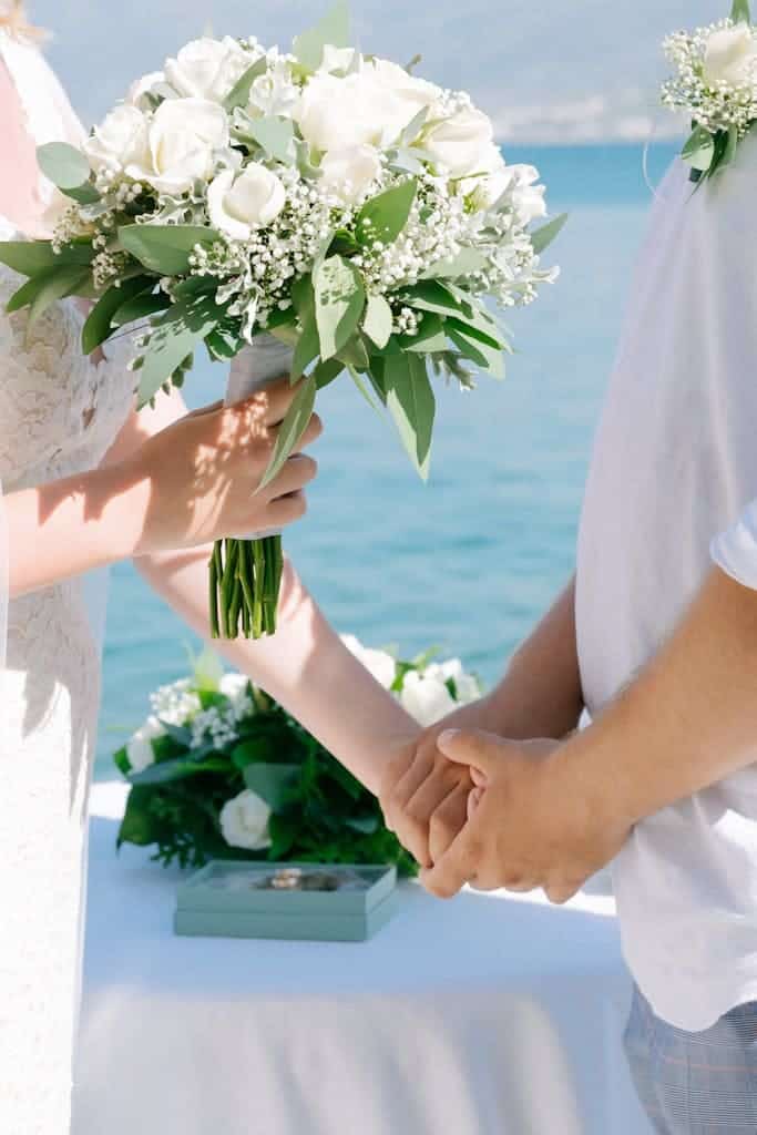 Bride and Groom During a beach Wedding 